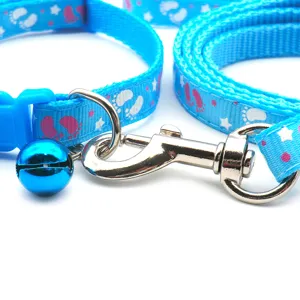 Blue pet collar and leash set with cute footprint pattern, durable metal hook and bell.