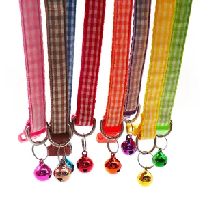 Colorful plaid pet collar with bell, adjustable neck strap for cats and dogs, cute pet accessory.