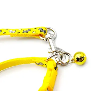 Yellow cartoon dog pet collar and leash set with cute bell and metal clasp for small dogs.