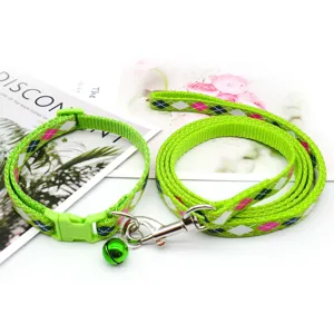 Green plaid dog collar and leash set with bell, durable nylon pet walking traction rope.