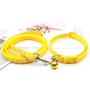 Yellow pet dog cat collar and leash set with cute bone pattern and a bell for walking