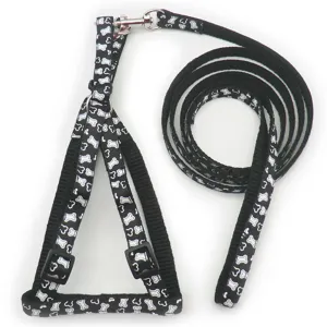 Black pet harness and leash set with white bone pattern, durable nylon for small dogs cats.