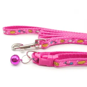 Cartoon print dog leash and cat collar set with bell and metal buckle, pink pet supply.