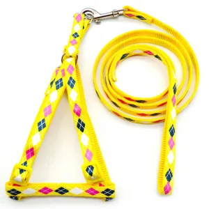 Yellow argyle dog harness and leash set, adjustable pet chest strap for puppy walking.