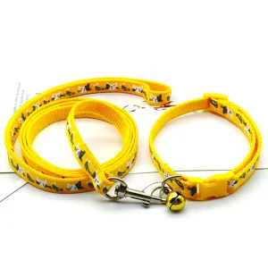 Yellow printed pet collar and leash set for small dogs and cats with cute bell and metal hook.