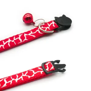 Red printed cat collar with bell, cute cat face breakaway safety buckle and D-ring pet necklace.