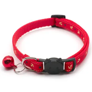 Red pet collar with anchor print, cute cat buckle, and bell detail for small dogs and cats.