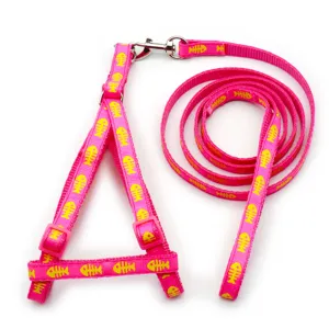Pink pet dog harness and leash set with yellow fish bone pattern detail view for daily walking use