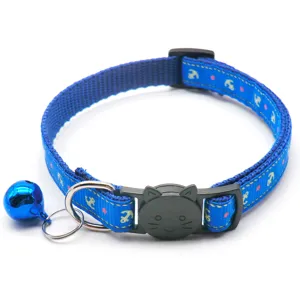 Blue pet collar with anchor print, cute cat buckle and bell, 1cm width detail shot.
