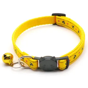 Yellow pet cat collar with cute anchor print, secure buckle, and bell for small dogs cats.