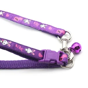 Purple pet collar set with cute bunny pattern and bell, durable nylon strap with safety buckle.