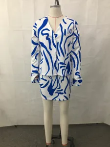 Women two-piece outfit long sleeve shirt and bodycon mini skirt with blue abstract print