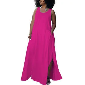 Plus size solid magenta sleeveless maxi dress detail view with side pockets and slit.