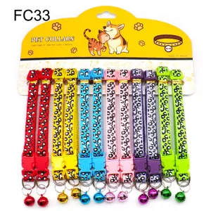 Colorful leopard print pet collar set with bells, adjustable fabric cat and dog neck strap.