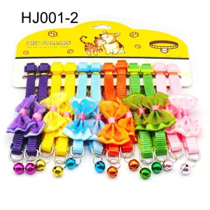Colorful pet collar detail showing fabric bowknot and cute metal bell on card packaging.
