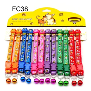 Colorful pet collar detail showing cute puppy print, durable nylon strap, and a jingle bell.