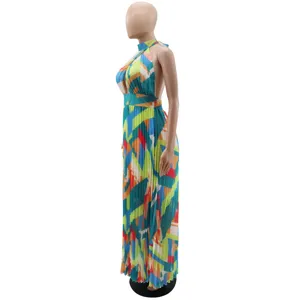 Detailed side view of colorful geometric halter pleated chiffon dress, backless design.