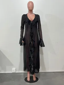 Black sheer long sleeve cover-up detail, ruffled V-neck beach cardigan design, elegant style.