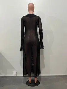 Black sheer long sleeve maxi dress detail, back view of mesh beach cover up garment.