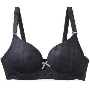 Detailed view of women's black push-up bra featuring elegant plaid pattern and underwire support.