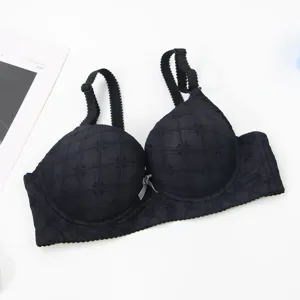 Black push-up bra for women featuring geometric texture, adjustable straps, and underwire support.