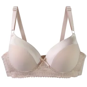 Details of women's push up lace bra, smooth solid color intimate apparel close up shot.