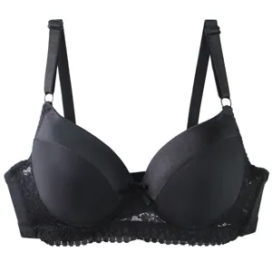 Close-up of black smooth push-up bra with delicate lace trim, adjustable straps and support.