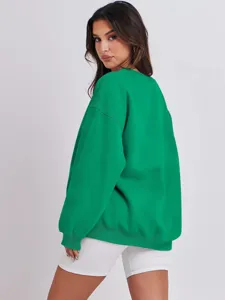 Πράσινο oversized casual φούτερ μακρυμάνικο με στρογγυλή λαιμόκοψη σε λεπτομερή εικόνα.