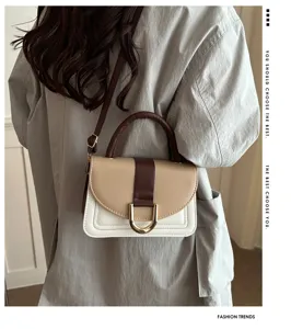 Borsa a tracolla alla moda in colore a contrasto con tracolla regolabile per donna.