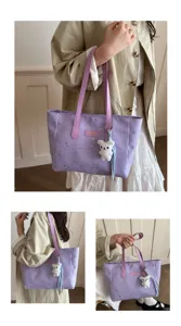 Detailweergave van de paarse Koreaanse shopper tas met sterrenmotief en schouderband.