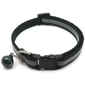 Close-up detail of the black reflective pet collar featuring a durable plastic buckle and bell.