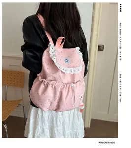 Sac à dos rose à motif d'étoiles et bordure en dentelle, cartable décontracté.