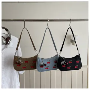 Cherry embroidered shoulder bag, casual daily handbag, stylish women's commuter denim bag detail.