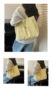 Sac cabas en toile à pois jaunes pour femmes, sac bandoulière décontracté avec poche avant.