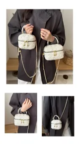 Detailed view of the white quilted mini crossbody bag with gold chain strap and chic design.