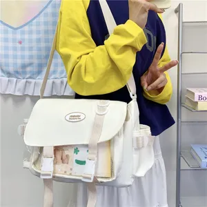 Cute Japanese style canvas crossbody messenger bag with transparent ita display pocket for students.
