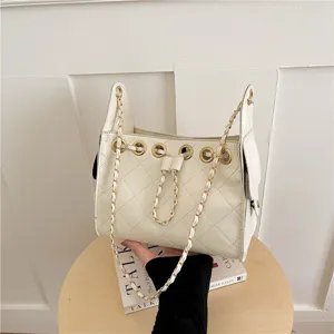 Chic white quilted bucket bag for women, leather woven chain shoulder handbag, versatile daily use.