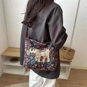Ethische Canvas Umhängetasche mit bunter Stickerei und Elefantenmuster für den täglichen Gebrauch.