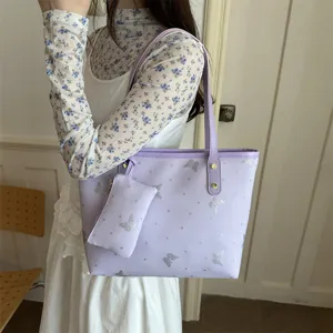 Trendy purple tote bag with cute butterfly pattern, stylish shoulder bag for daily commute.