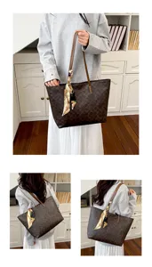Detail view of women large capacity brown monogram tote bag with chic decorative silk scarf.