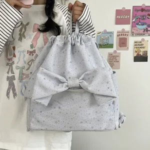 Zaino con coulisse e stampa stelle azzuro chiaro grande fiocco stile coreano carino.
