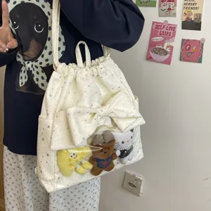 Zaino con coulisse stampa stelle bianche con grande fiocco e tasca trasparente peluche