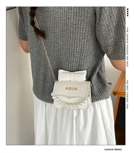 Süße kinder weiß leder umhängetasche mit schleife perlen kette mädchen handtasche