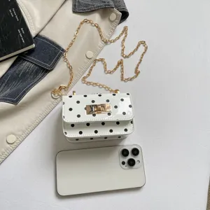Trendy white polka dot small square bag with gold chain strap, stylish summer bag.