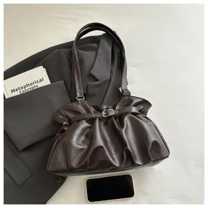 Dark brown ruched shoulder bag for women, stylish tote handbag for daily commute and versatile use.