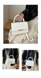 Élégant sac à main bandoulière vintage blanc pour femme avec motif texturé et détail chic.