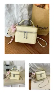 Chic quilted vanity crossbody bag for women, trendy cute shoulder bag with bear pendant.