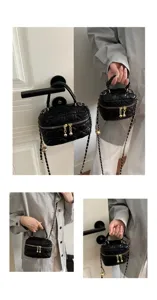 Black quilted crossbody bag with chain strap, chic designer style mini shoulder handbag for women.
