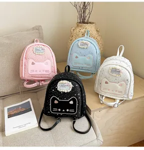 Detailed shot of cute cartoon cat pattern small backpack in multiple colors for daily use.