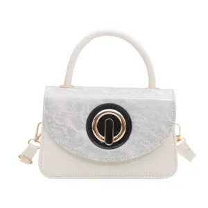 Minimalist women's handbag with textured marble flap, top handle and stylish metal clasp.